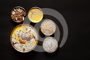 Close-up of Creamy rice Kheerkhir Garnished with saffron and dry fruits for pooja spiritually celebration. Indian delicious photo