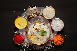 Close-up of Creamy rice Kheerkhir Garnished with saffron and dry fruits for pooja spiritually celebration. Indian delicious photo