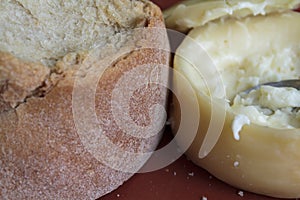 Close-up of creamy and soft cheese and bread