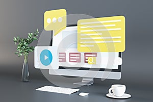 Close up of creative dark designer table with icons on computer monitor, coffee cup, decorative plnat in vase and keyboard.