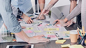 Close up creative designer applaud for job success at meeting table at office