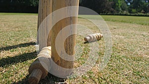 Close up of cricket bails removed from stumps