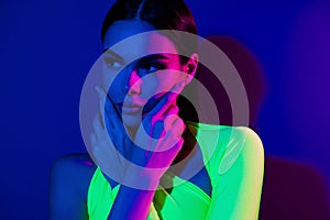 Close up cropped photo of tender lovely model girl hands touch face look empty space isolated on neon background