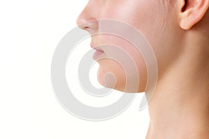 Close-up cropped profile portrait of good-looking woman nose, neck, chin. Beauty anti-aging procedures. Skin care