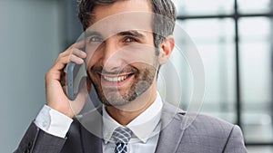 Close up cropped side profile portrait of a successful young man, having a business conversation