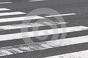 Close-up crosswalk on asphalt road