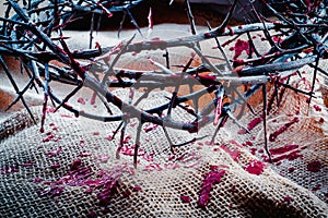 Close up crown of thorns in blood as a symbol of death and resurrection of Jesus Christ for our sins