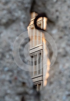 Close up of the crumbling remains of the Berlin Wall at the Wall Memorial, Germany. Segments of wall have been left as a reminder