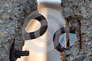 Close up of the crumbling remains of the Berlin Wall at the Wall Memorial, Germany. Segments of wall have been left as a reminder