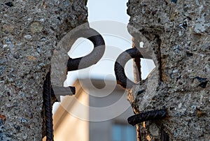 Close up of the crumbling remains of the Berlin Wall at the Wall Memorial, Germany. Segments of wall have been left as a reminder