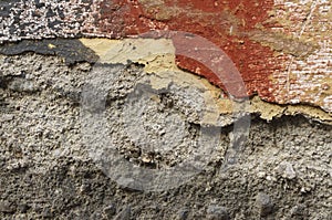 Close up of crumbling wall with layers of peeled paint 9