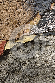 Close up of crumbling wall with layers of peeled paint 8