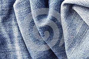 Close up crumpled the blue denim fabric texture