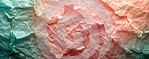 Close-up of crumpled blue, pink, and white wrapping paper with soft textured look