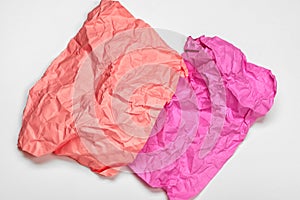 Close up of a crumpled paper with curled edge on white background