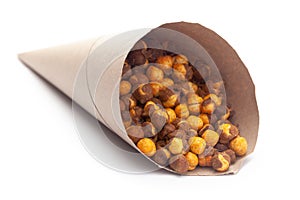 Close-Up of Crunchy Roasted Chana Masala In handmade  handcraft  brown paper cone bag, made with Bengal Grams or Chickpeas.