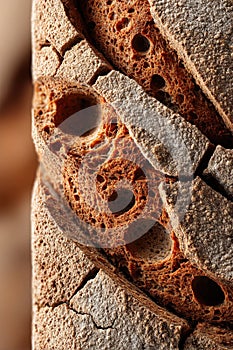 Close-up of crust and crumb textures in rustic sliced bread interior