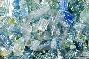 Close-up of crystals of natural mineral aquamarine blue beryl. Crystals background
