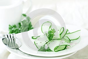 Close up cucumber salad and with the chia seeds and green parsley leaf , heathy salad for anti aging with rich of antioxidant org