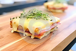 close-up of cut croque monsieur, layers of ham and cheese shown