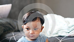 Close Up , Cute Baby Holding Bottle And Drinking Milk.