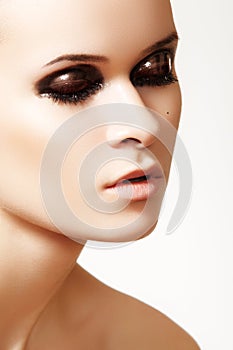 Close-up of cute model with fashion gloss make-up
