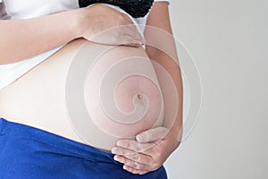 Close up of a cute pregnant