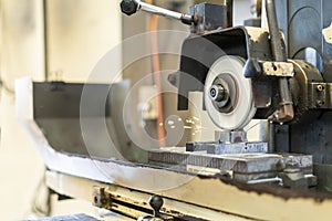 Close up cutting or grinding wheel during rotating or working with product on high accuracy and automatic surface horizontal