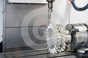 Close up cutting tool working with workpiece propeller  by high speed and  accuracy cnc machining center