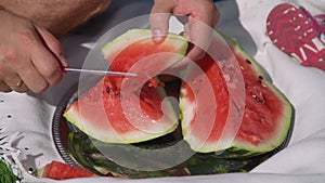 Close Up of Cutting Watermelon on the Nature