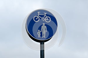 Close up of a cycle lane and pedestrians road sign