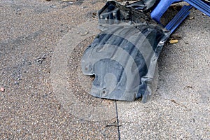 Close up of damaged car wheel on the road after the accident