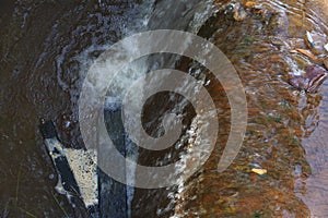 Close-up of the dams water. water coming out of the dam. water from irrigation canals