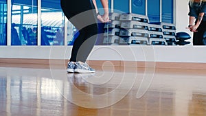 Close-up of dancer`s legs, girl dancing the hip-hop