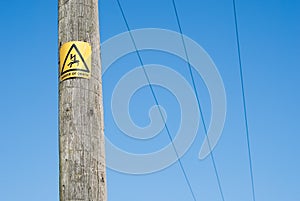 Close up of Danger sign on electricity pole