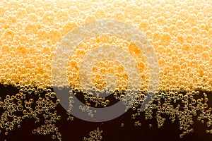 Close-up dark beer with foam