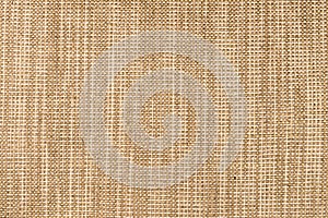 Close up of dark beige colored fine textured cotton