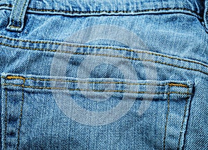 Close up of dark blue old jeans texture background. Blue Jeans texture-gray background