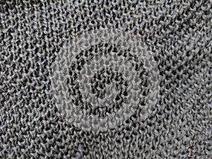close-up of dark grey wool knitted texture