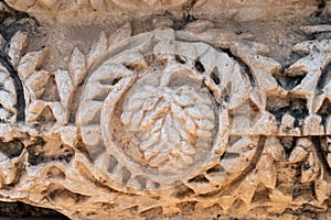 Close up of dates carving at the ruins of Capernaum in Israel.