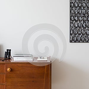 Close-up on decorations on wooden sideboard