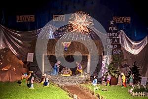 Close up of decorative house made of Jesus Christ with mother marry on Holy day of Christmas.