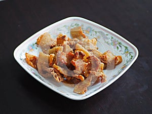 Close-up deep fried streaky pork belly.