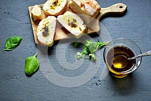 Home made italian ciabatta bread, olive oil and parmesan cheese