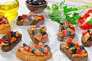 Close-up of delicious bruschetta with pieces of mackerel fish