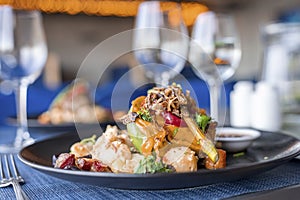 Close-Up of delicious food served in plate on dining table at restaurant