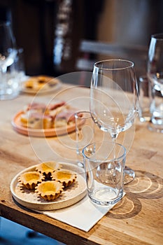 Gourmet tartlets and canapes prepared for wine pairing photo