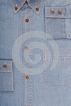 It is a close-up of denim shirt.