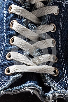 Close-up of denim shoe laces