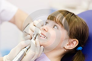 Close-up dentist procedure of teeth polishing with clean